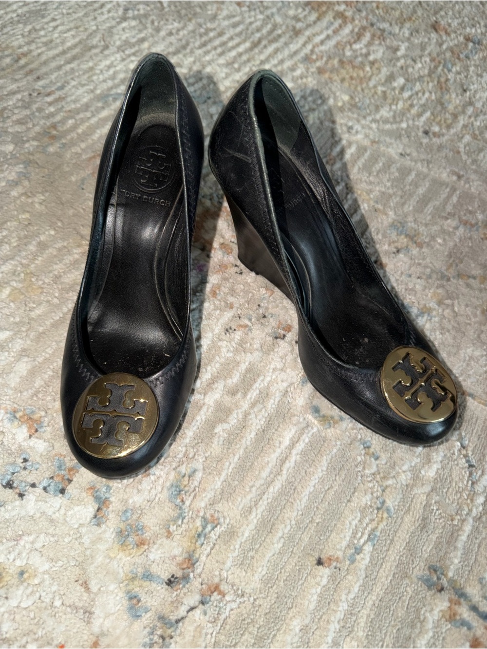 Tory Burch Black Leather Wedge Pumps with Gold Logo Medallion